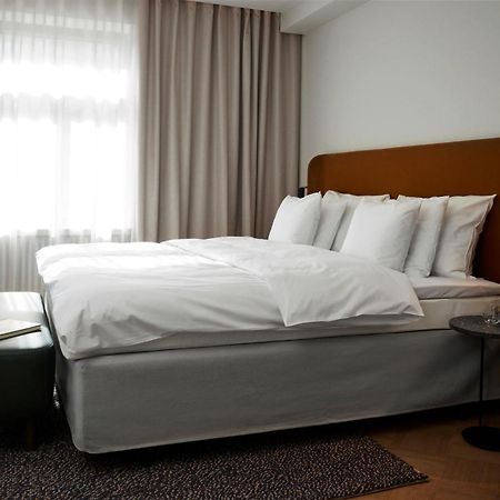 Solo Sokos Hotel Torni Helsinki Exterior foto A bed with a bed skirt